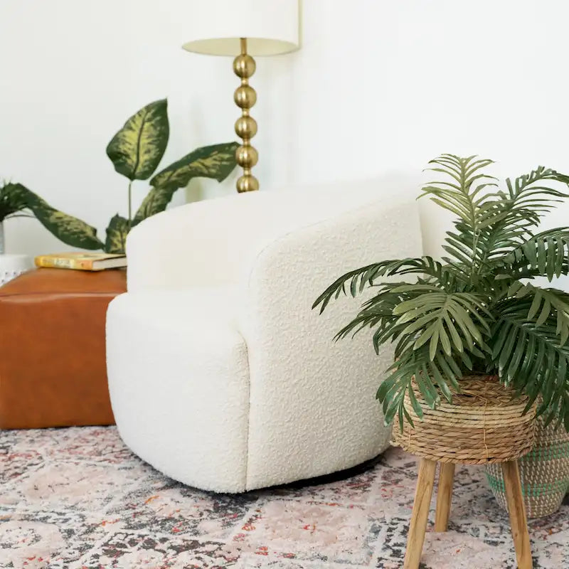 Fauteuil pivotant en tissu bouclé style Mid-century Modern