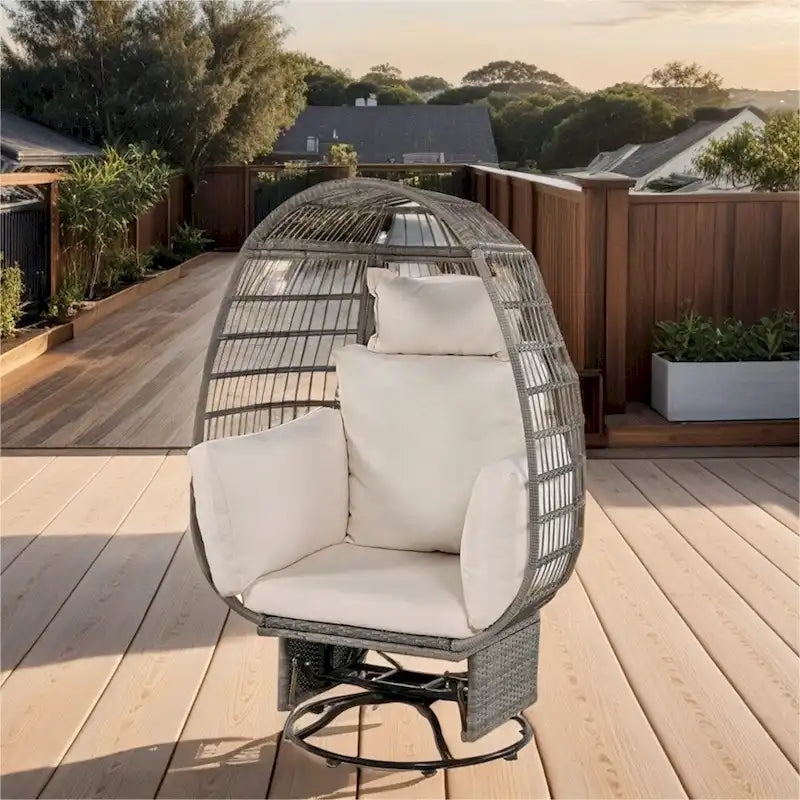 Fauteuil œuf pivotant en rotin avec fonction de bascule et coussins