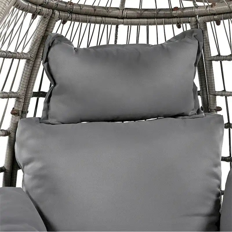 Fauteuil œuf pivotant en rotin avec fonction de bascule et coussins