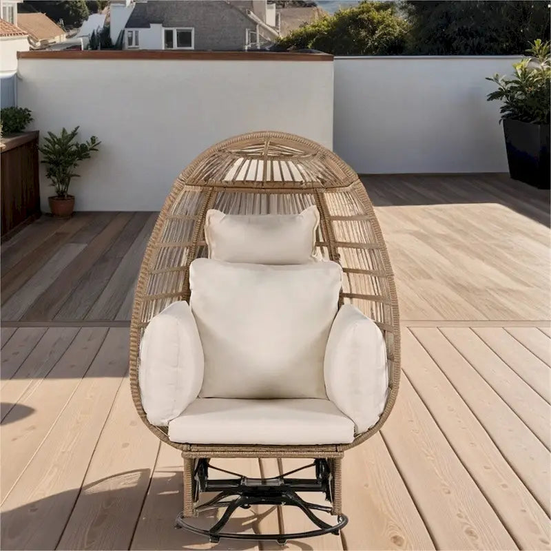 Fauteuil œuf pivotant en rotin avec fonction de bascule et coussins