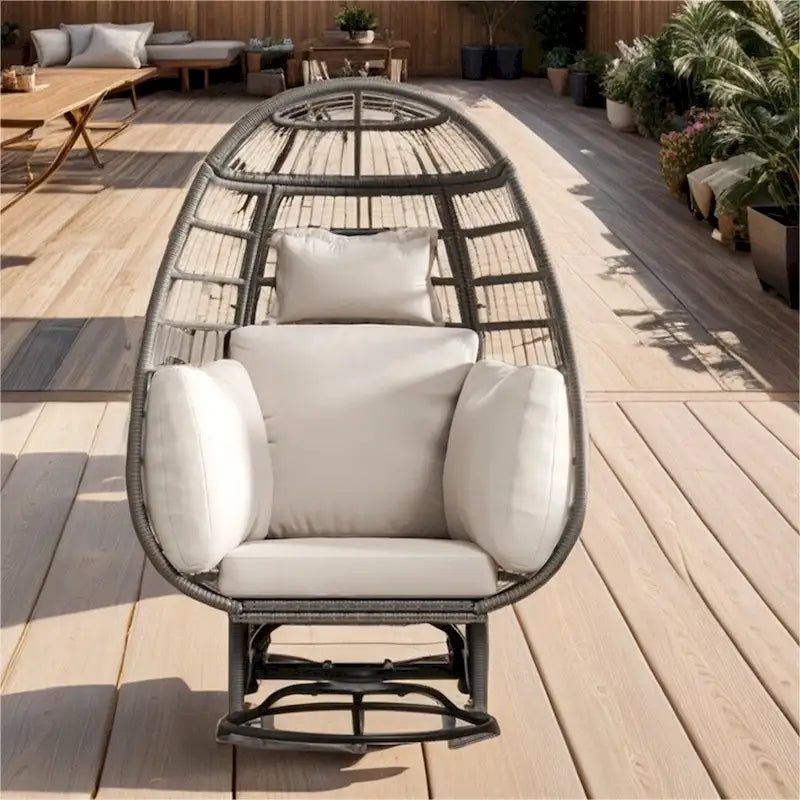 Fauteuil œuf pivotant en rotin avec fonction de bascule et coussins
